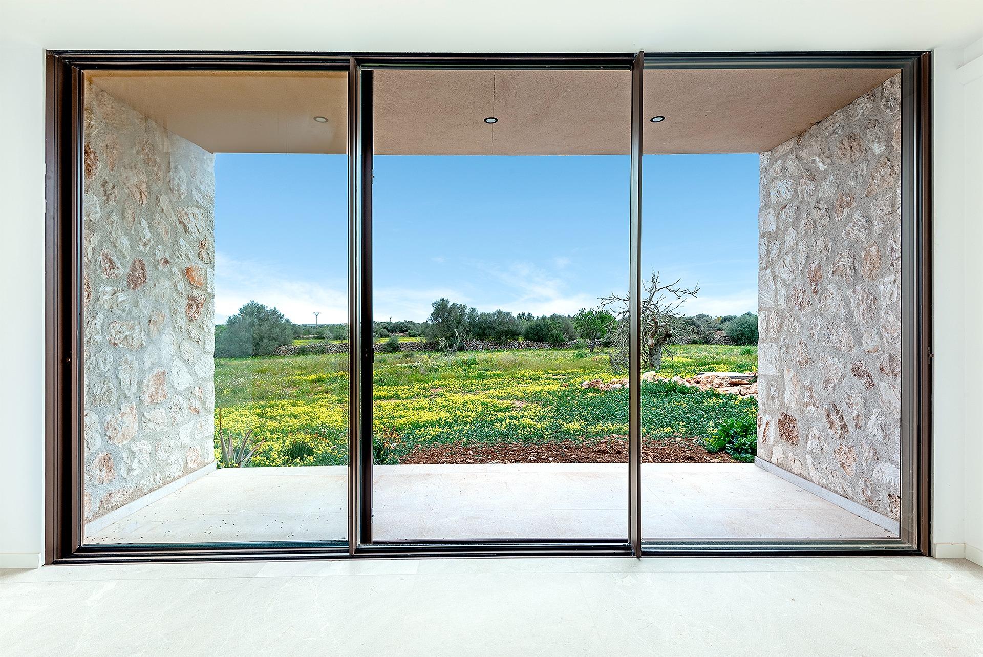 Stylish, newly built country house with swimming pool and panoramic views in Ses Salines