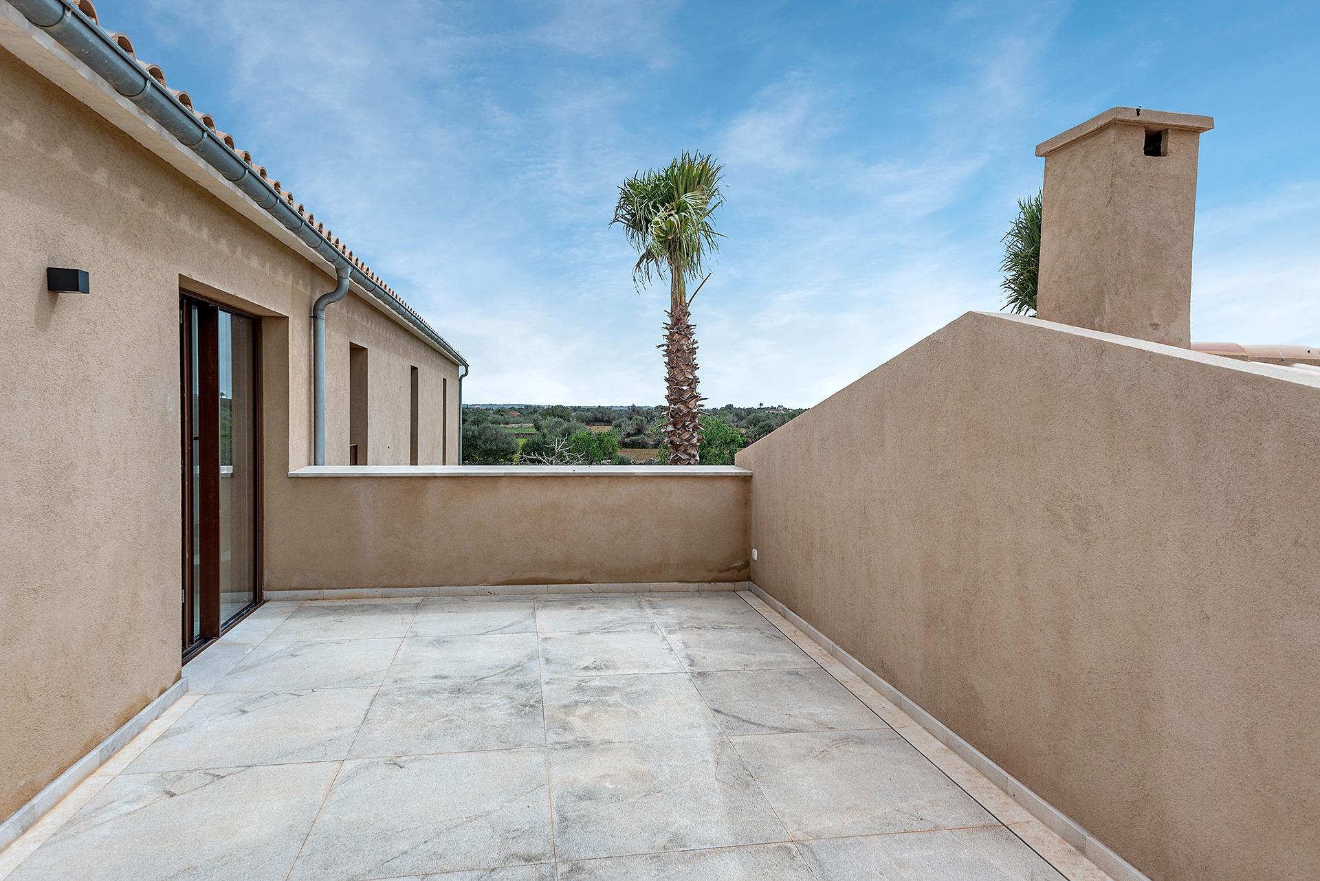 Stylish, newly built country house with swimming pool and panoramic views in Ses Salines