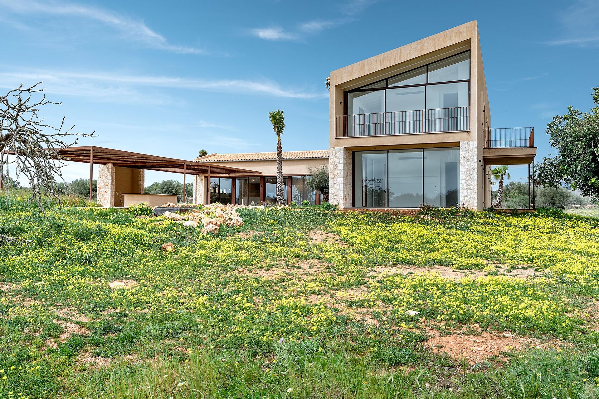 Stylish, newly built country house with swimming pool and panoramic views in Ses Salines