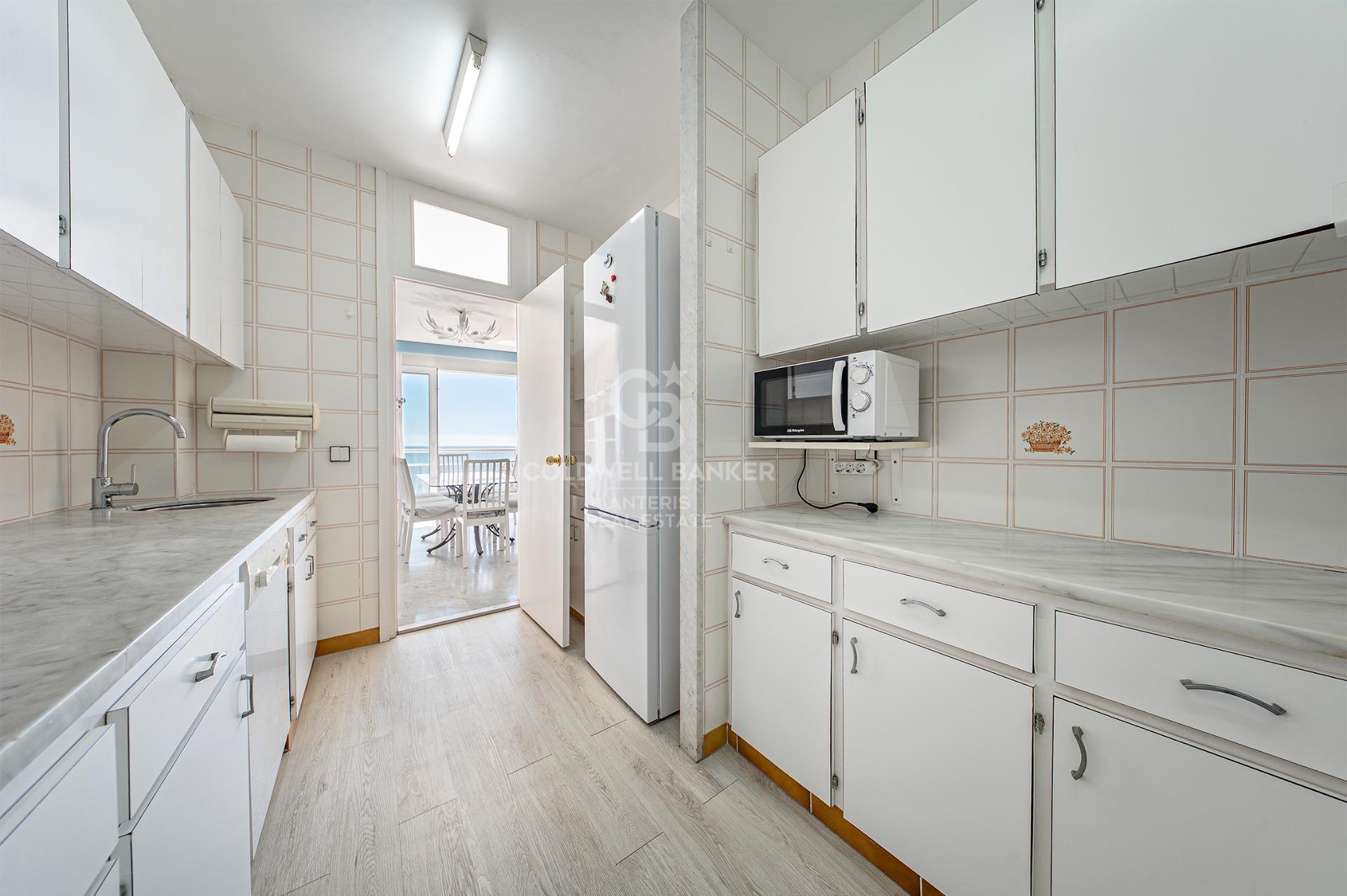 Seafront apartment with terrace and open sea views in Lloret de Mar, with the option to purchase a parking space