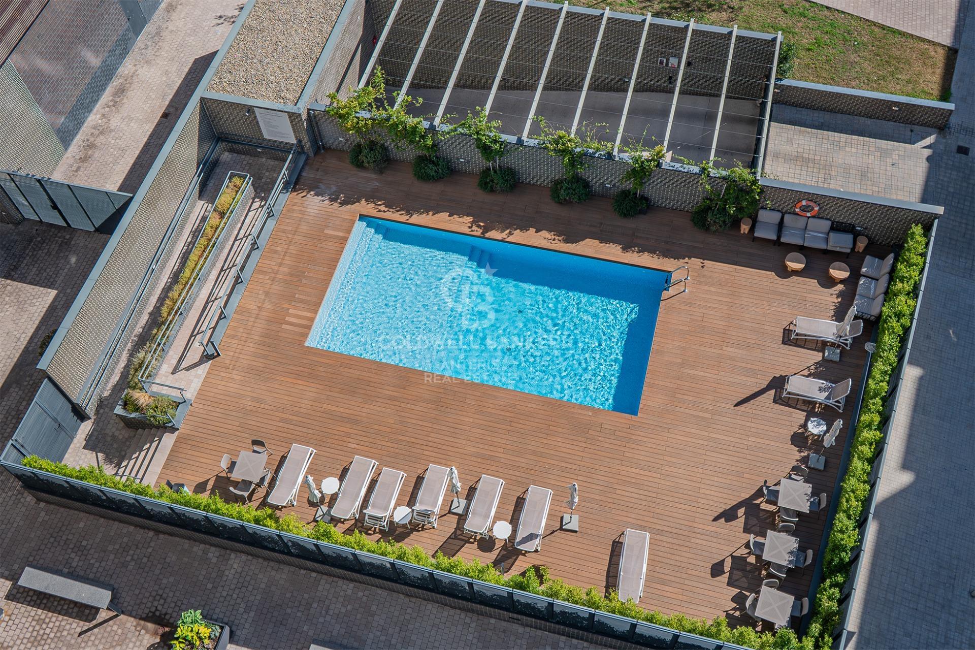 New development penthouse with two parking spaces, a storage room, and a communal area with a swimming pool