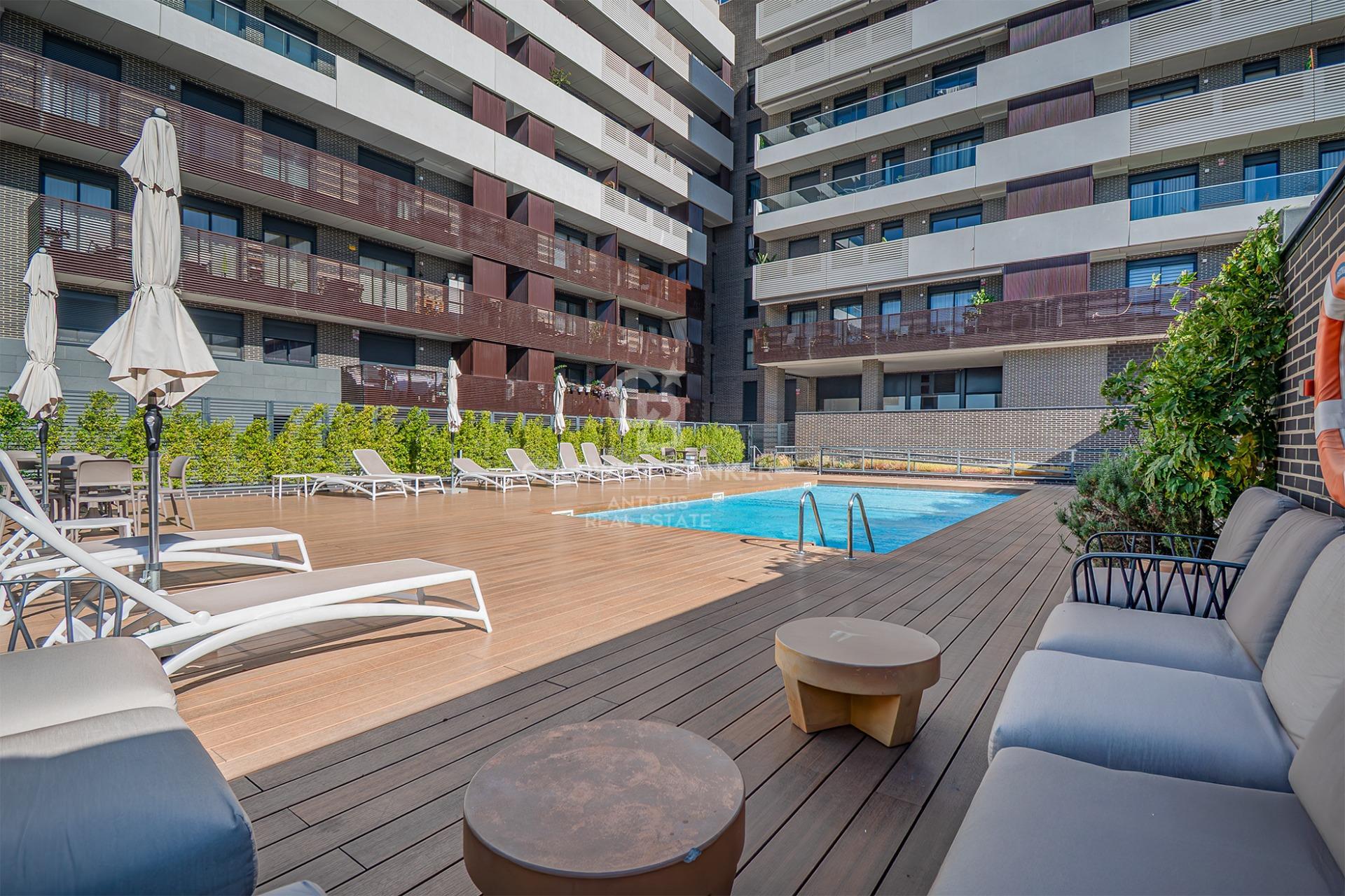 New development penthouse with two parking spaces, a storage room, and a communal area with a swimming pool