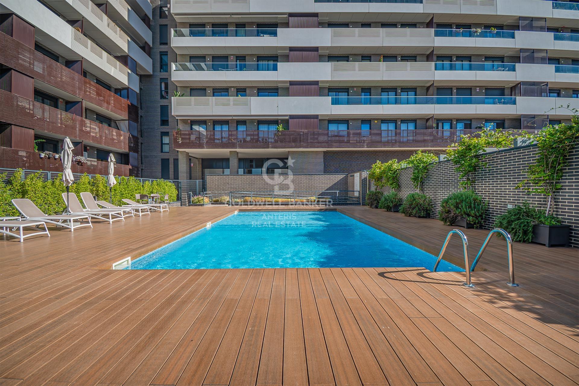 New development penthouse with two parking spaces, a storage room, and a communal area with a swimming pool